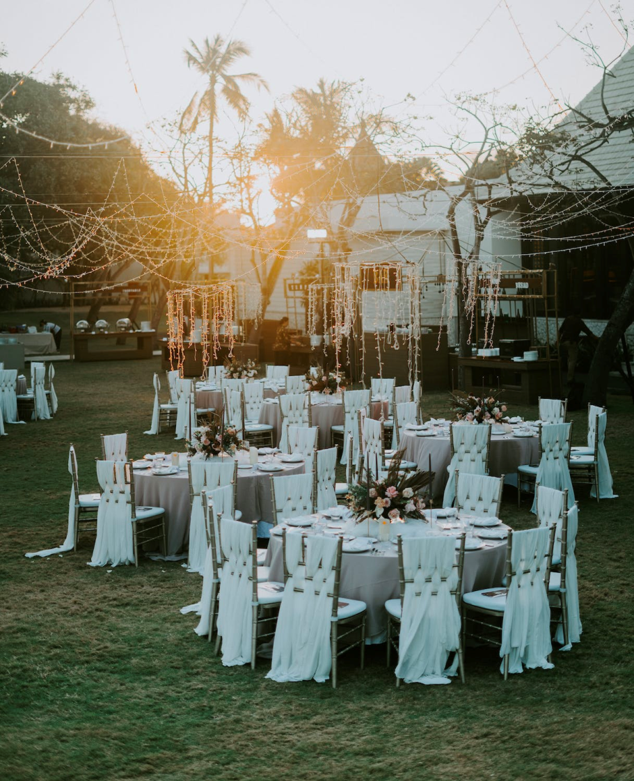 A dreamy backyard wedding with cozy outdoor event lighting