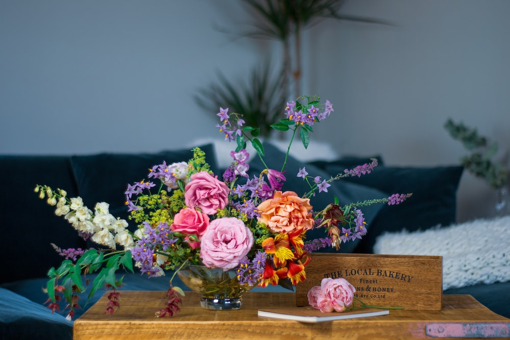 Several flower arrangements on a table