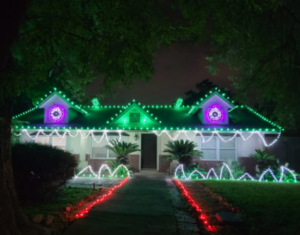 Safe and stylish Halloween lighting installation with illuminated pumpkins and glowing pathway lights.