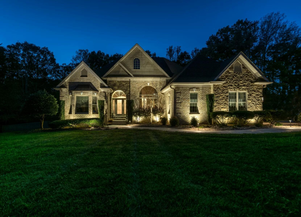 A house with landscape lighting